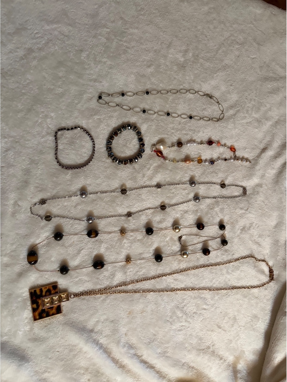 Set of jewelry accessories variety of necklaces bracelets brown sparkly black